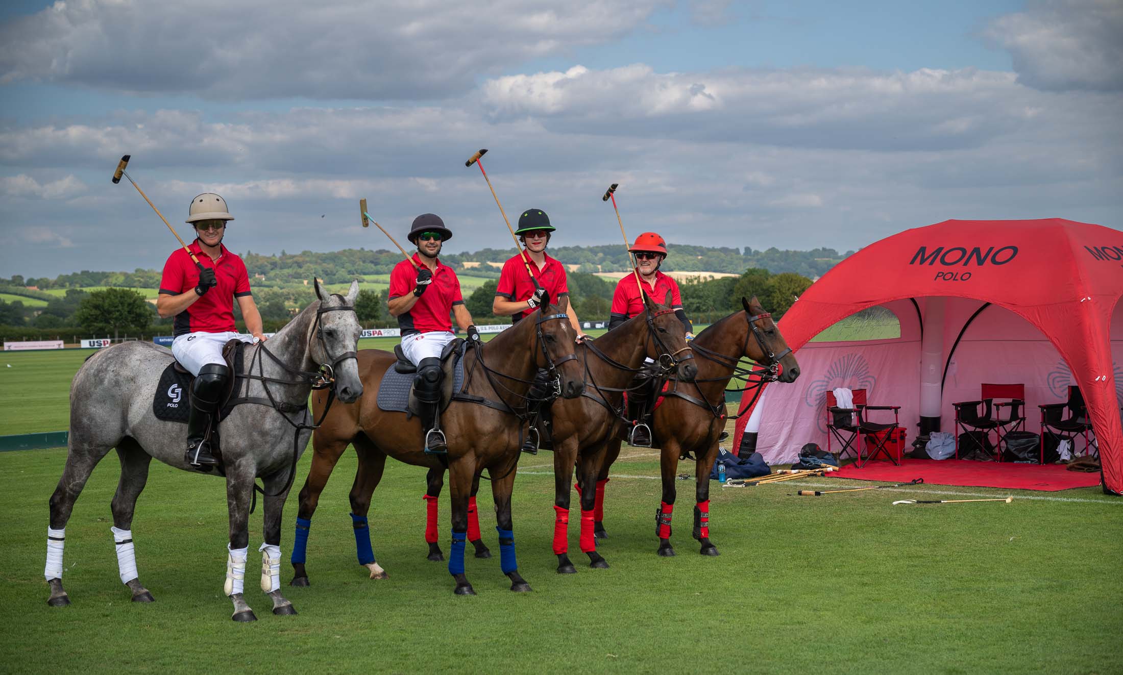 The Mono Polo team lined up on horseback at Lodsworth